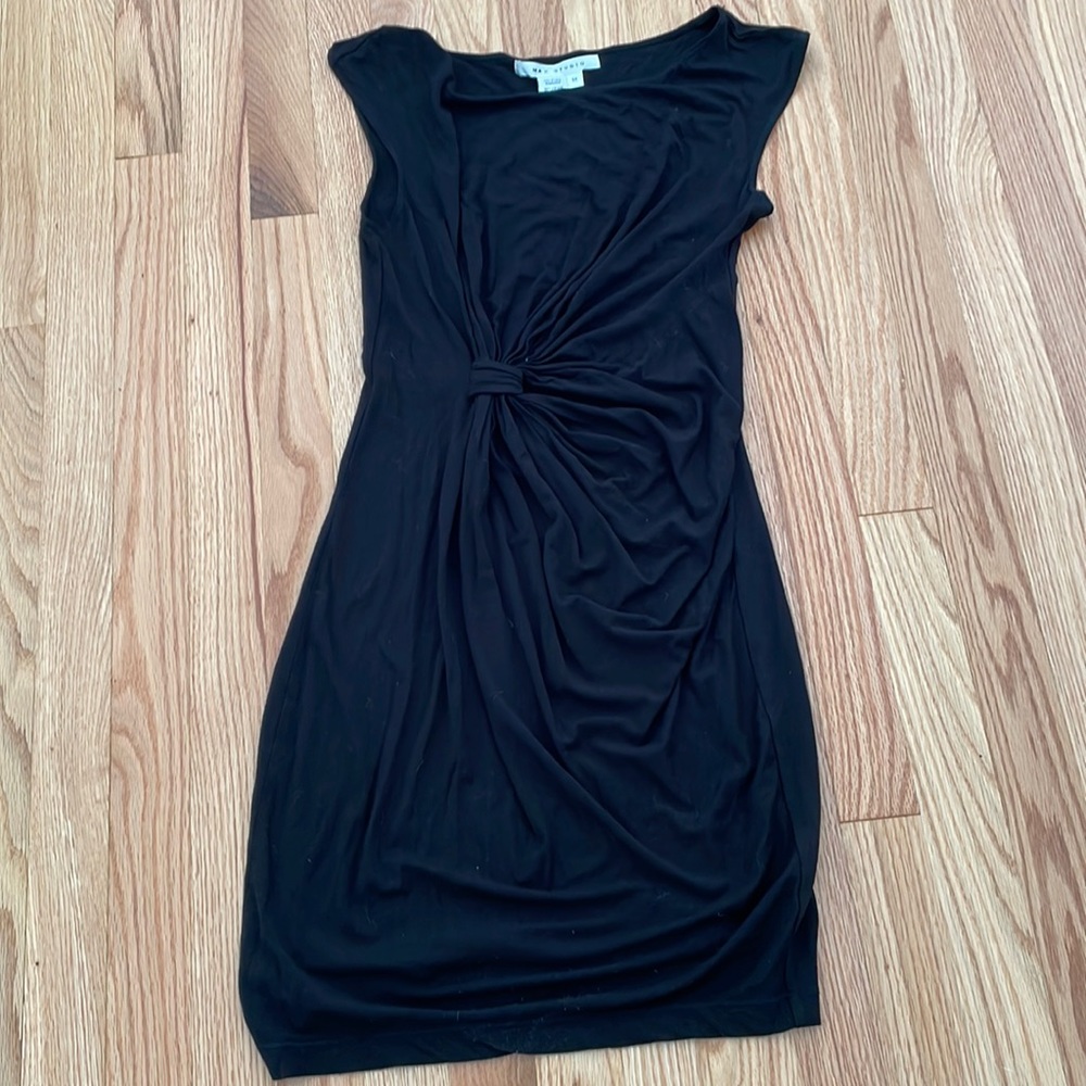 Cute form fitting black dress